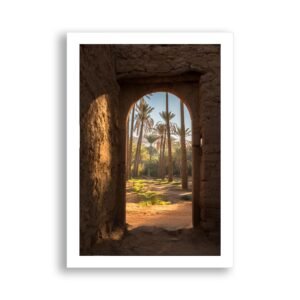 Palm trees seen through an ancient archway in a AlUla's desert oasis